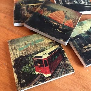 Stone city skyline transporting on coasters